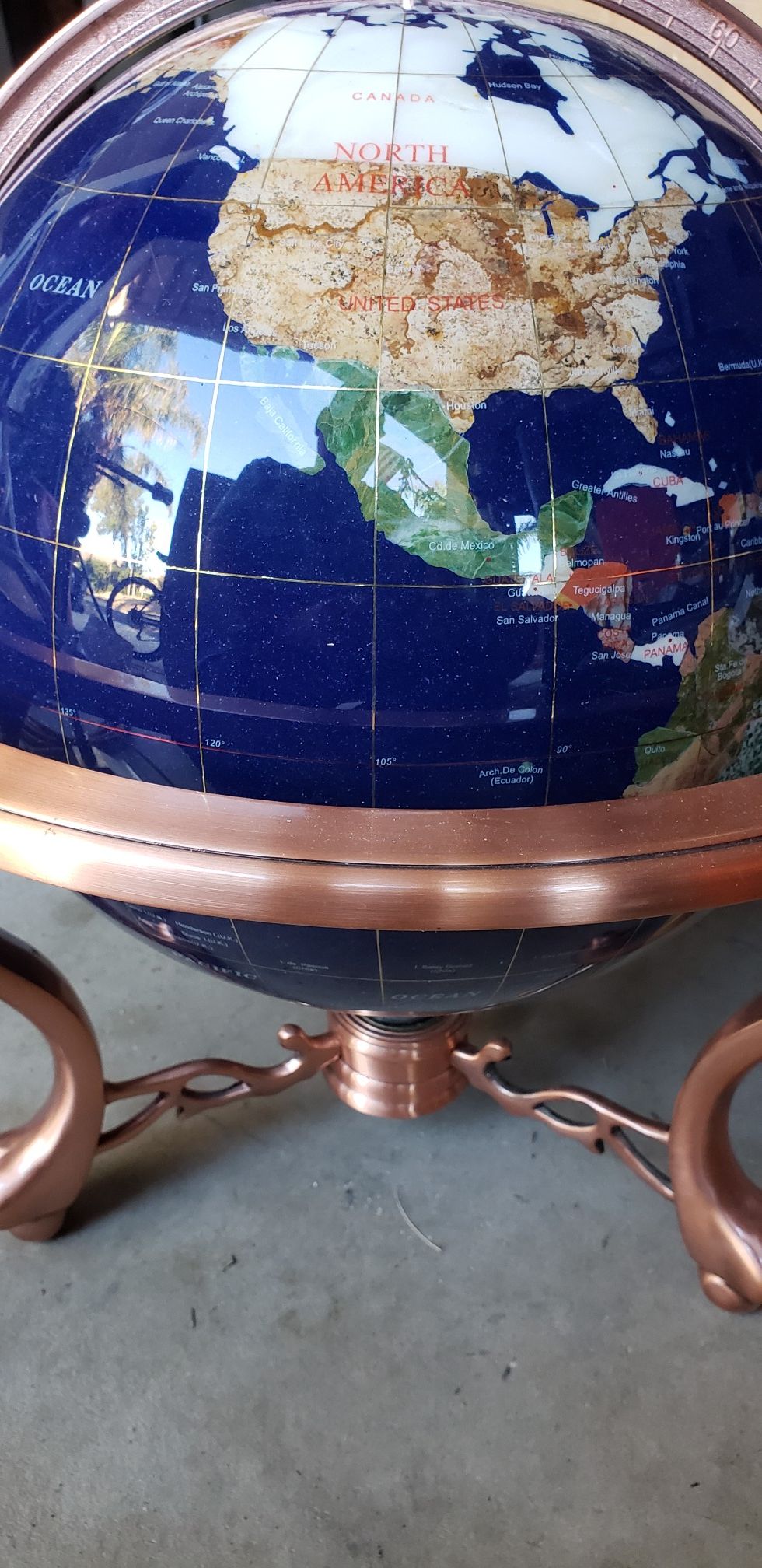 Large gemstone globe with compass