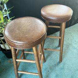 Vintage vinyl padded wooden barstools