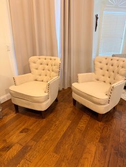 Pair of Tufted Accent Chairs with Nailhead Trim