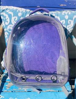 Small backpack pet carrier.