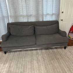 The sofa is from the Pottery Barn store.