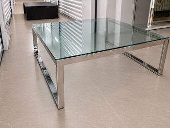 Coffee table with Glass Top and Chrome Base  by Grafton furniture