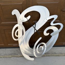 Arti & Mestieri modern abstract wall clock featuring, 