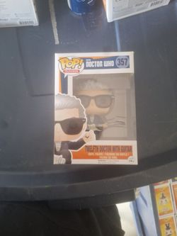 The Twelfth Doctor With Guitar Pop Vinyl