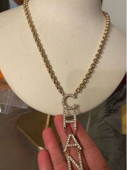 Chanel drop necklace cold hardware stamped on the back