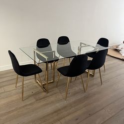 Big Glass Dining Table And 6 Black Chairs