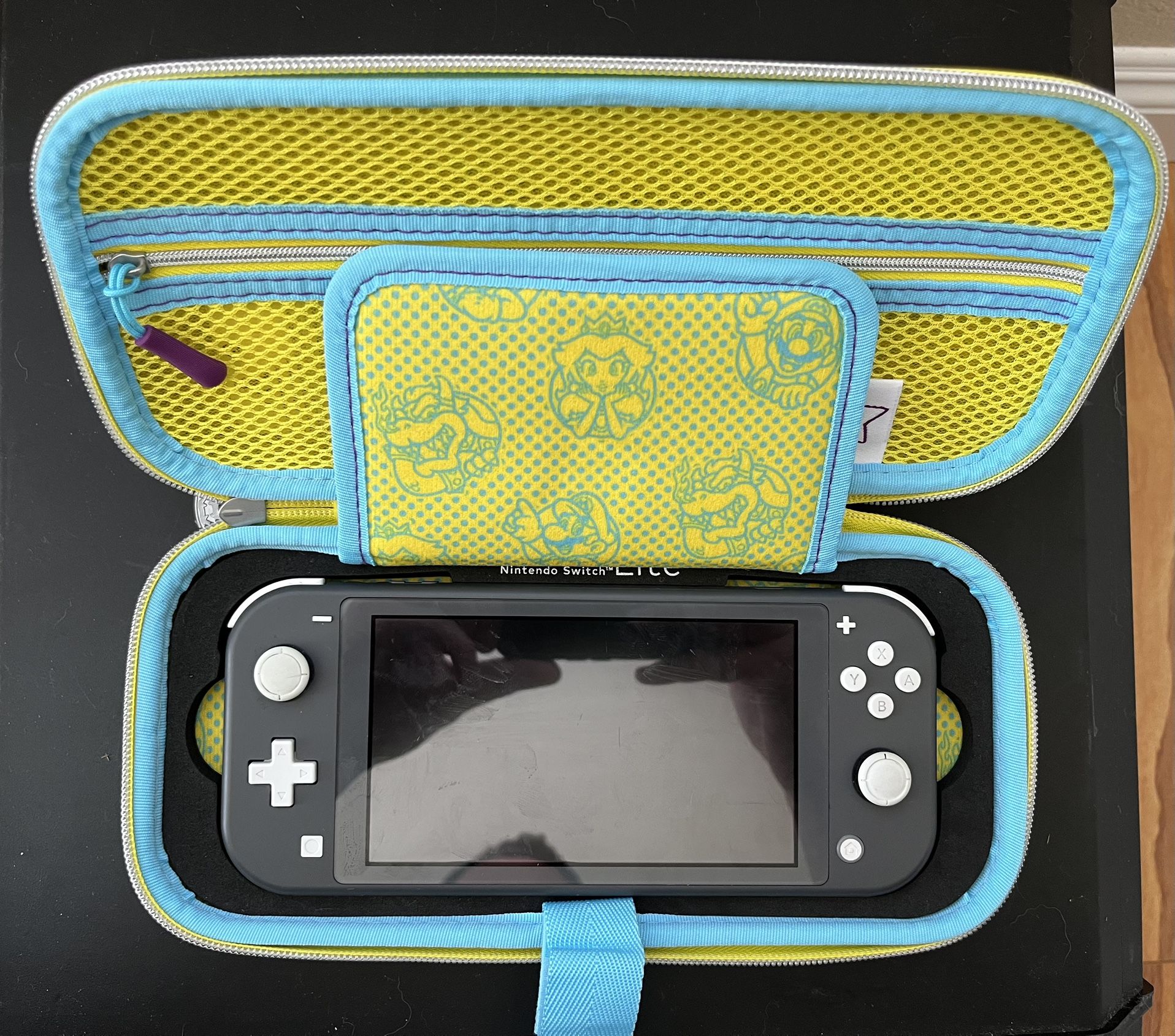 Excellent Condition Switch Lite + 128gb Memory Card + One Year Warranty and Case
