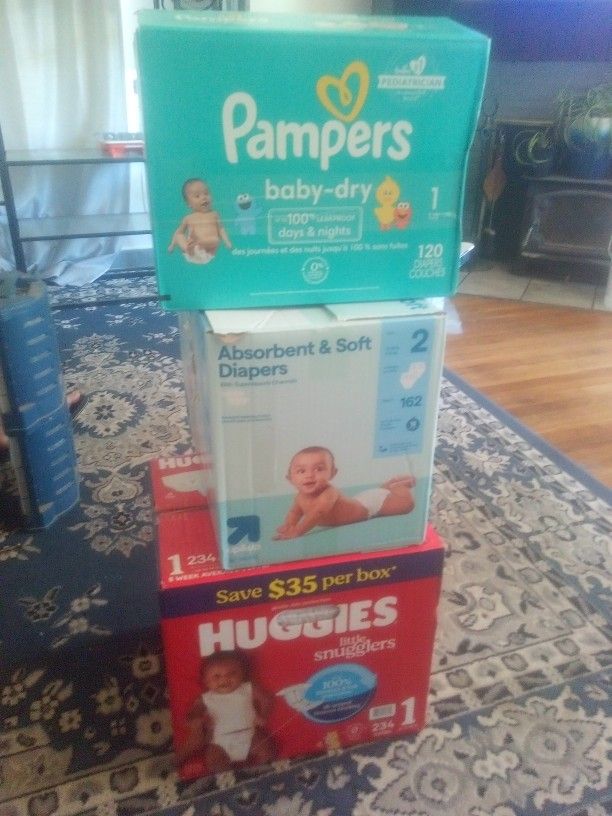Three Cases Size One And Two Diapers