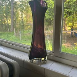 vintage amethyst purple art glass swung vase with a 3-petal or footed design.