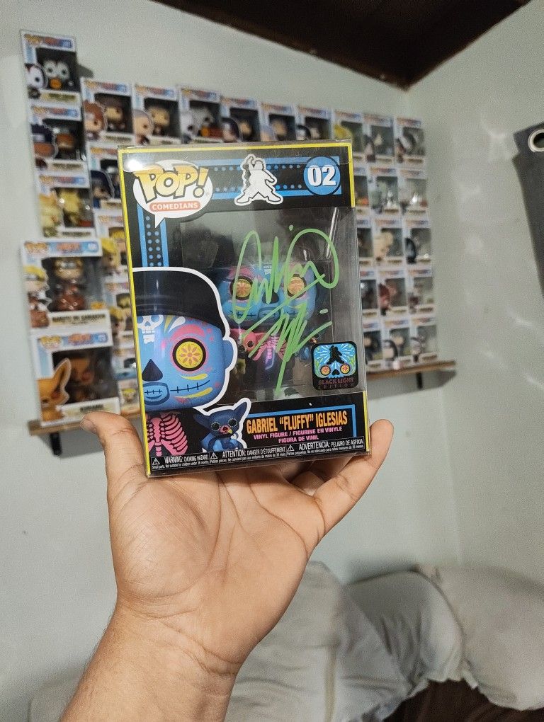 Signed Gabriel Iglesias Black Light Pop Figure.