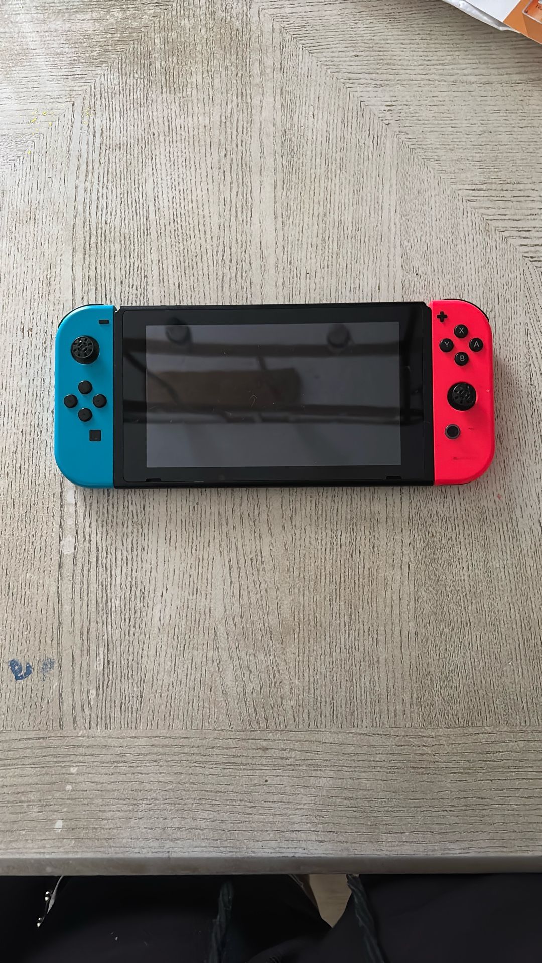 Nintendo Switch With 3 Games On Disc, 14 In Console