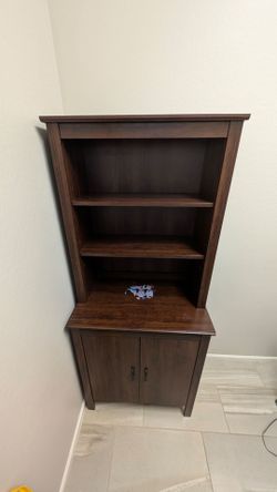 Dark wood hutch with lower cabinet from IKEA