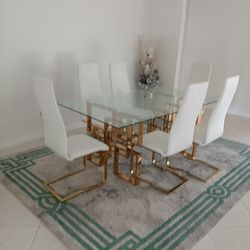 Golden Dining Room Table With Six Chairs And Accessories