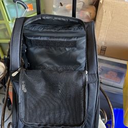 Rolling pet carrying bag backpack