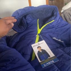 Brand new coat texting on it size large 14 to 16