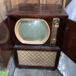 1950s Magnavox Tv In Stand It Turns On.  Top Has Scratches 
