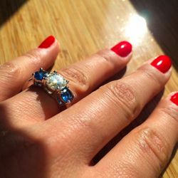 Platinum, Moissanite, and Blue Sapphires Three Stone Ring - Engagement/Wedding Ring - Size 7