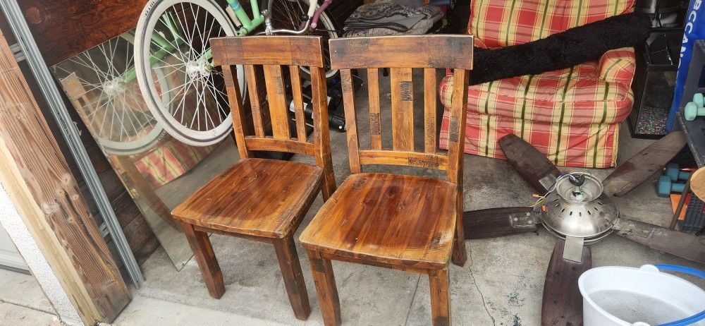 Two Solid Wooden Chairs