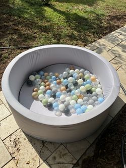 Soft play ball pit with some balls