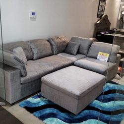 Summer clearance sale. Lima gray sectional sofa with ottoman now $999. Easy finance option. Same day delivery.
