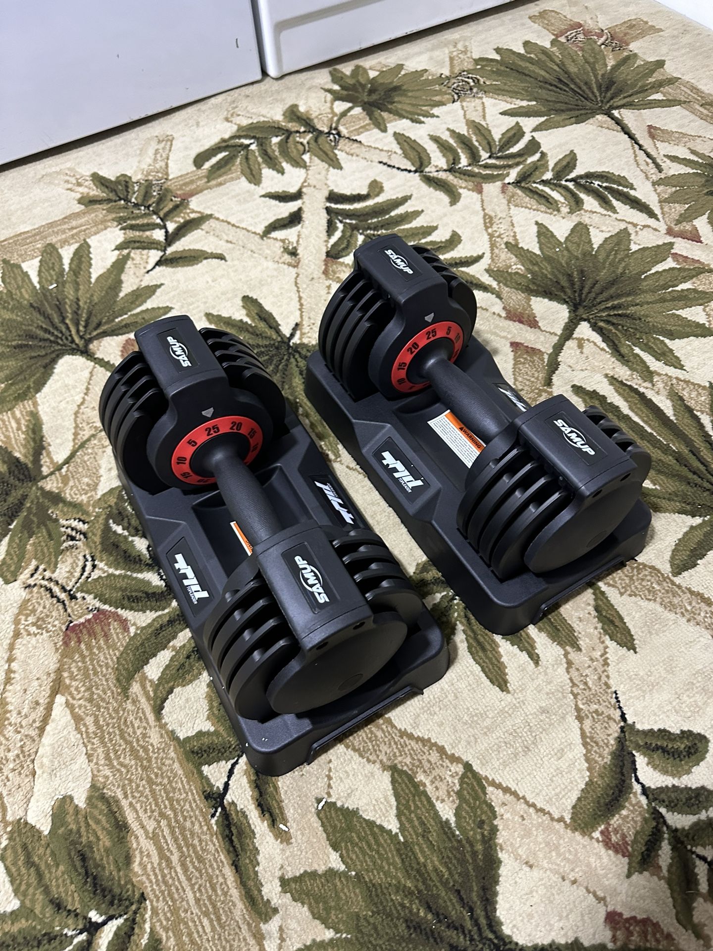 Pair Of Adjustable Dumbbells