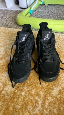 Black cat Jordan 4s