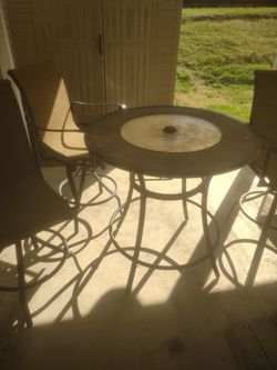 Patio table and 4 chairs