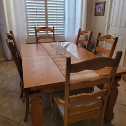 Dining room table with 6 chairs by Broyhill