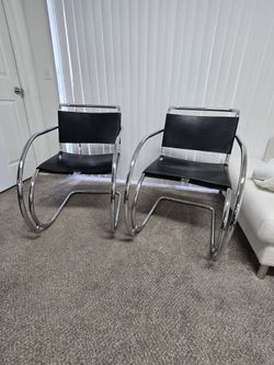 Modern Chair Designer /Stainless Steel and saddle Leather