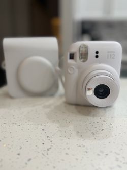 Insta mini 12 out carrying case/purse. $95