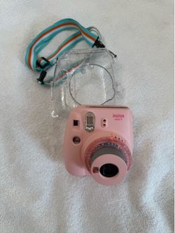 NEW FUJI INSTAX MINI 9 PINK CAMERA WITH CLEAR SPARKLY CASE WITH A RAINBOW STRAP. TESTED WORKS
