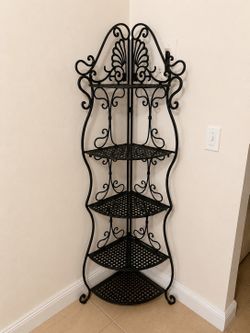 Black wrought iron corner shelf