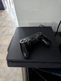 Sony PS4 Slim Console with Controller