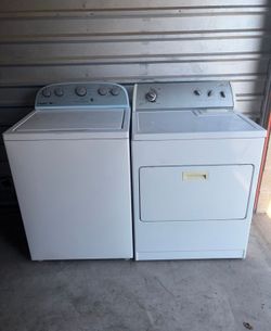 White Whirlpool Washer And Electric Dryer