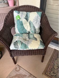Wicker chair with cushions