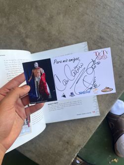 Luchador book with signed card