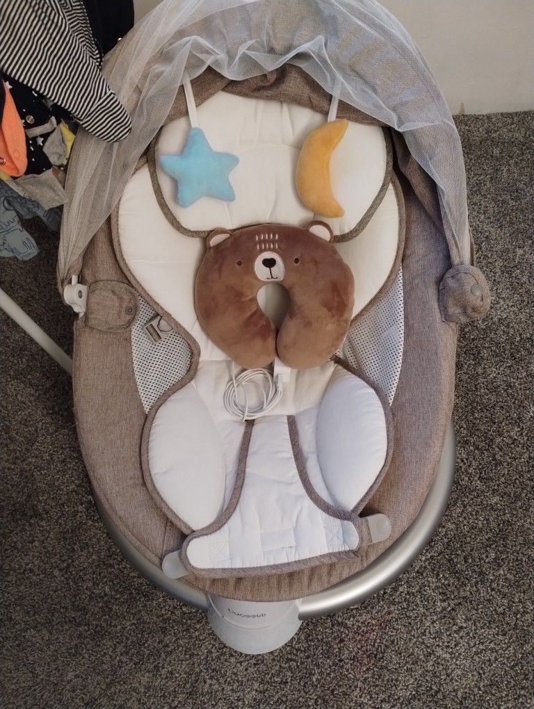 Infant Crib, Bassinet, Swing Carrier And Baby Bouncer Along With 0 3 Size Onesie And Outfits And A Pair Of 0 3 Size Shoes. .  & Accessories