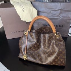 100% Authentic Louis Vuitton Monogram Artsy MM. Discontinued 