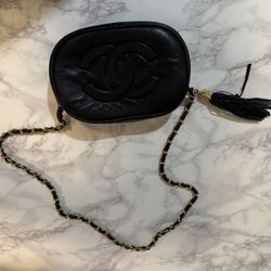 vintage black leather Lambskin camera bag with a tassel and chain-link shoulder str