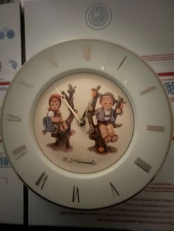 M.J. Hummel Wall Clock beautiful plate but not running.