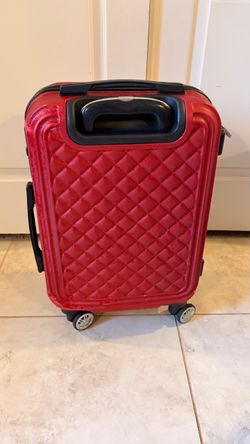 Red Carry-on luggage with 360° spinner wheels. Used in good condition.