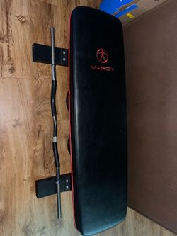 Weight bench, curl bar, and weight plates
