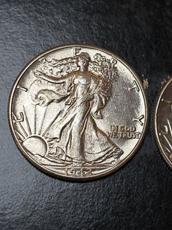 1942 WALKING LIBERTY HALF DOLLARS (BU)
