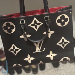 Louis Vuitton “OnTheGo MM” Bag