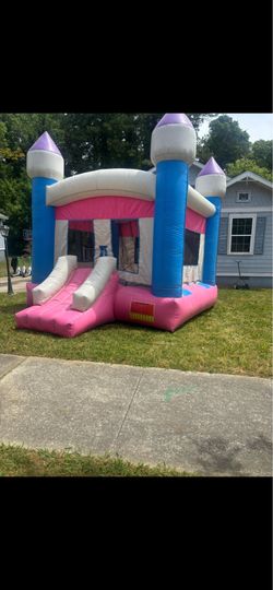 Pink blue white castle, bounce house