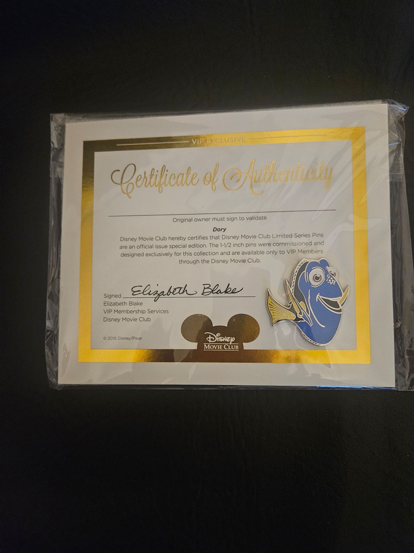 Disneys Dory pin with certificate