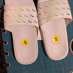 New Pumas Sandals ..size 5