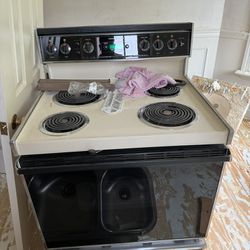 Electric GE Stove And Over Stove Microwave 