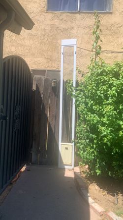 Doggie door for sliding glass door