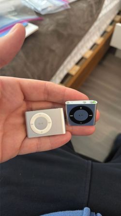 2 iPods (one regular 1 Water Proof 